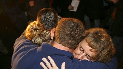 Family members initially celebrated after incorrect information that 12 US miners were found alive.