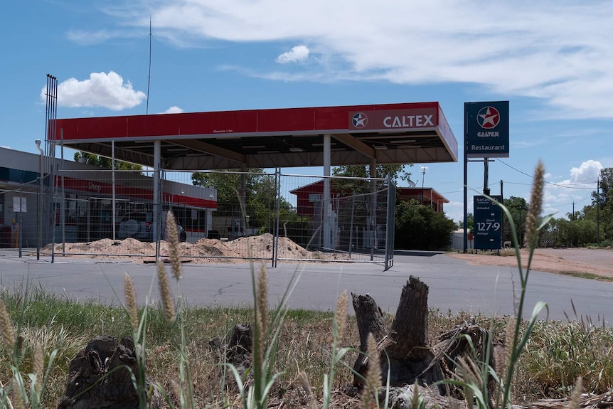 Caltex roadhouse with a fence up around the bowsers