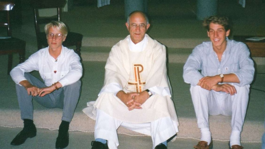 Father Victor Rubeo with Paul (L) and Adam Hersbach (R) in the 1990s.