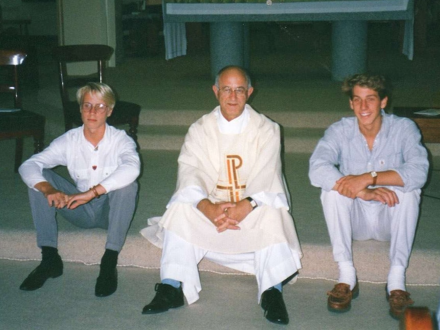 Father Victor Rubeo with Paul (L) and Adam Hersbach (R) in the 1990s.