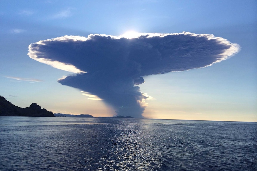 An ash plume from the Sangeang Api volcano