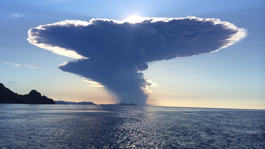 An ash plume from the Sangeang Api volcano