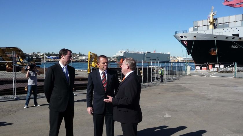 Tony Abbott speaks with WA Premier Colin Barnett at a wharf in Freemantle on July 23, 2010.