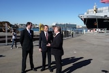 Tony Abbott speaks with WA Premier Colin Barnett at a wharf in Freemantle on July 23, 2010.
