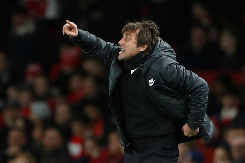 Antonio Conte yells out from the sideline during the Chelsea v Arsenal Premier League match.