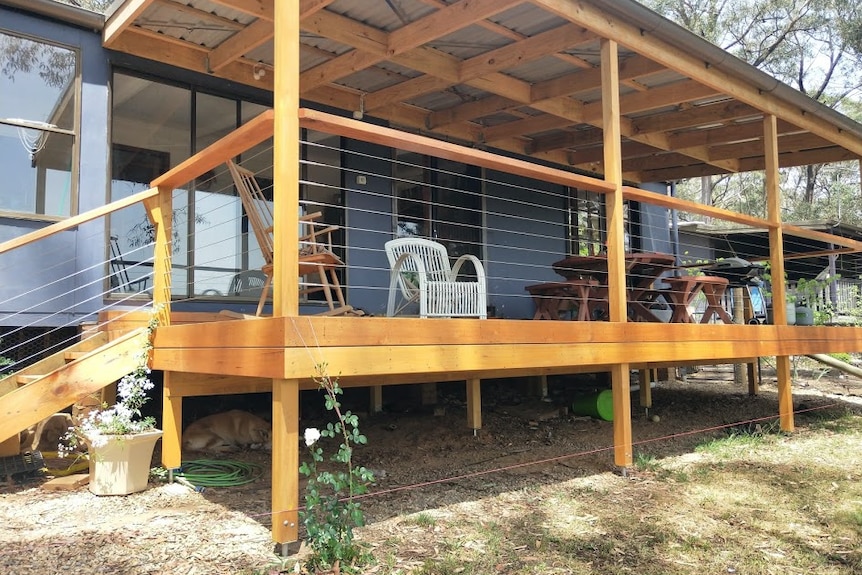 Wooden house with deck.