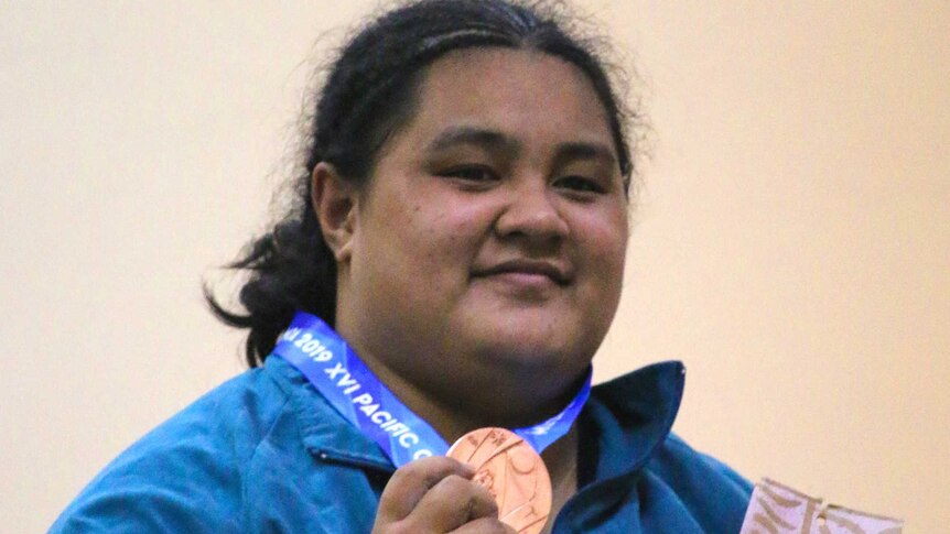 Australian weightlifter Charisma Amoe-Tarrant with her 2019 Pacific Games bronze medal.