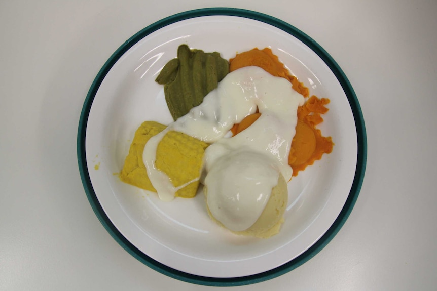 A dish of ravioli, beans, and mashed potato.