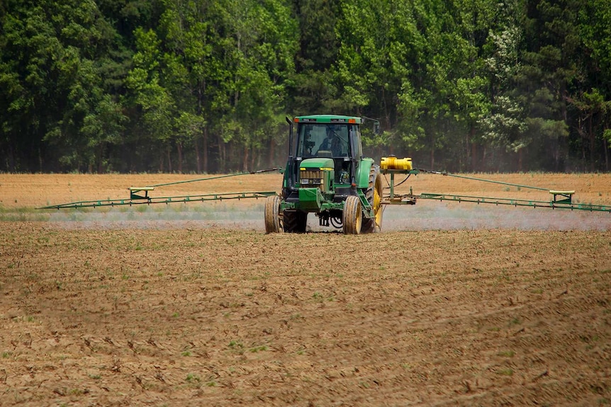 A tractor on a field.