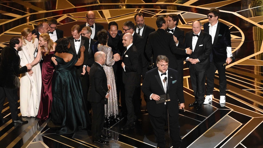 Guillermo del Toro and the cast and crew of The Shape of Water accept the award for Best Picture.