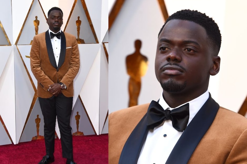 Actor Daniel Kaluuya wears a tan suit on the red carpet.