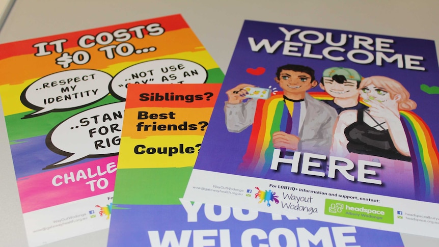 Colourful posters promote messages of welcome and diversity.
