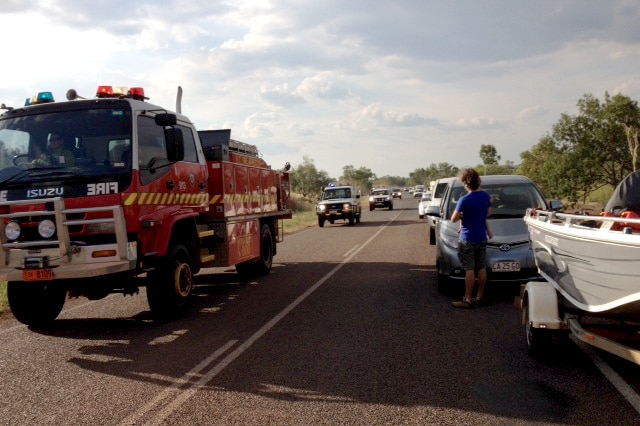 Emergency vehicles attend the scene of a deadly car crash