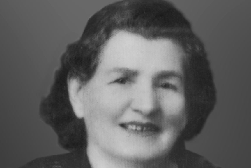 A black and white portrait photograph of a woman.