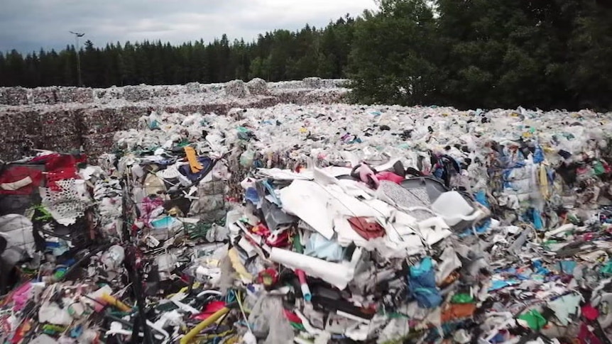 Drone footage shows the extent of recycling stockpiling in Sweden.