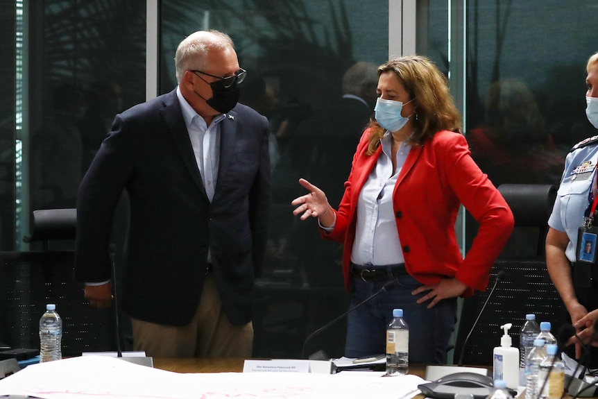 Scott Morrison and Palaszczuk discuss at a board table with a map.