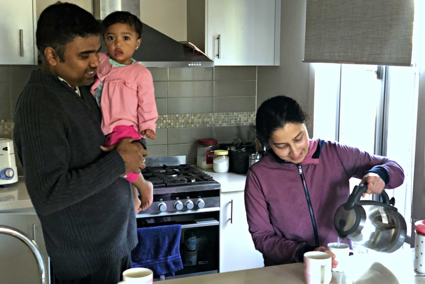 Naveen Samrat and Aparna Hegde with their two kids at the Point Cook home.