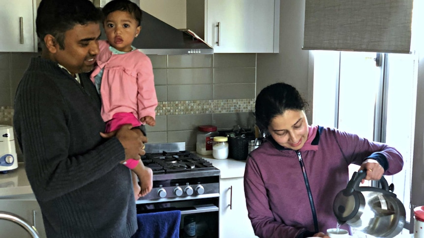 Naveen Samrat and Aparna Hegde with their two kids at the Point Cook home.