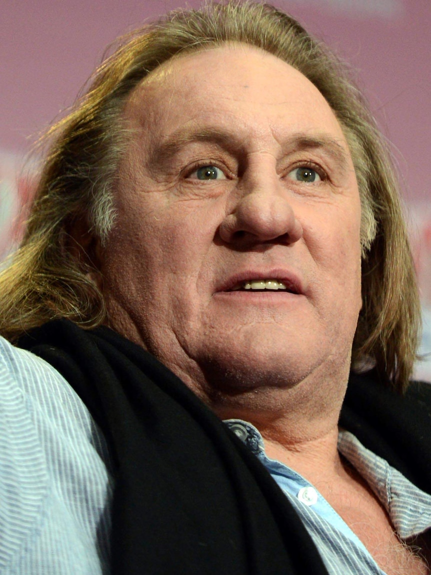 Gerard Depardieu gestures during a photocall.