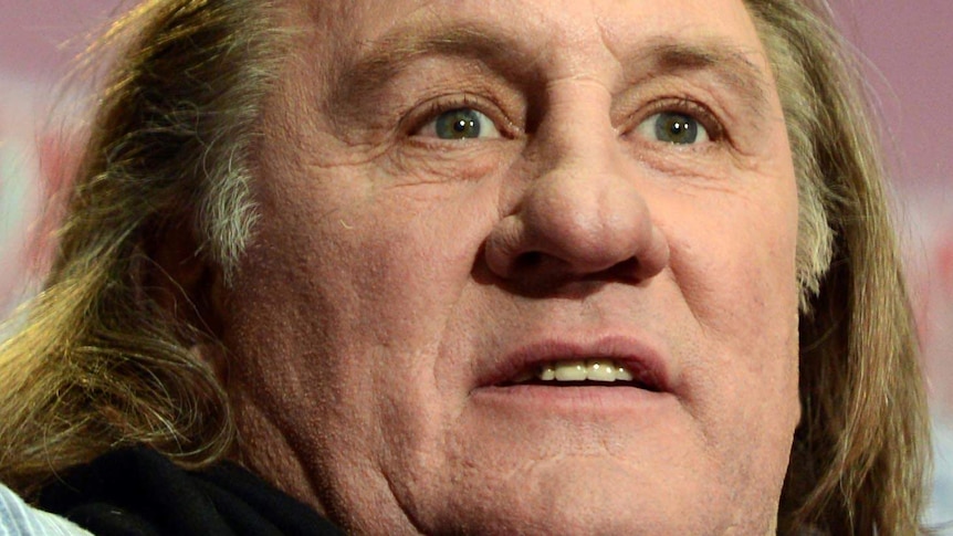 Gerard Depardieu gestures during a photocall.