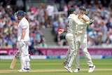 Pat Cummins and Alex Carey celebrate as Bairstow looks at his stumps