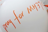 Malaysia Airlines pray for MH370