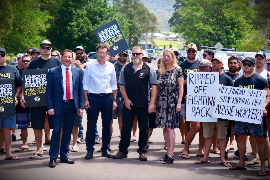 Labor MPs Paul Scully, Stephen Jones and Sharon Bird stand alongside CFMEU members picketing with signs at Wongawilli Colliery