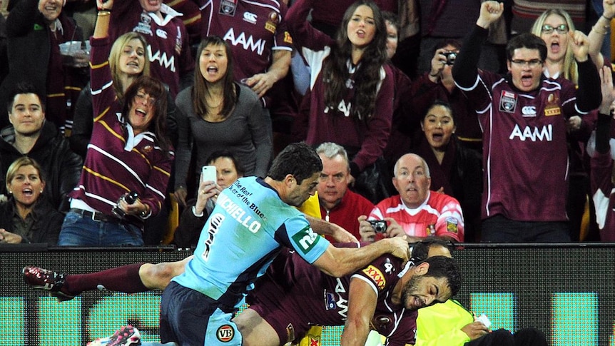 Greg Inglis scores the opening try for Queensland, his 11th Origin try.