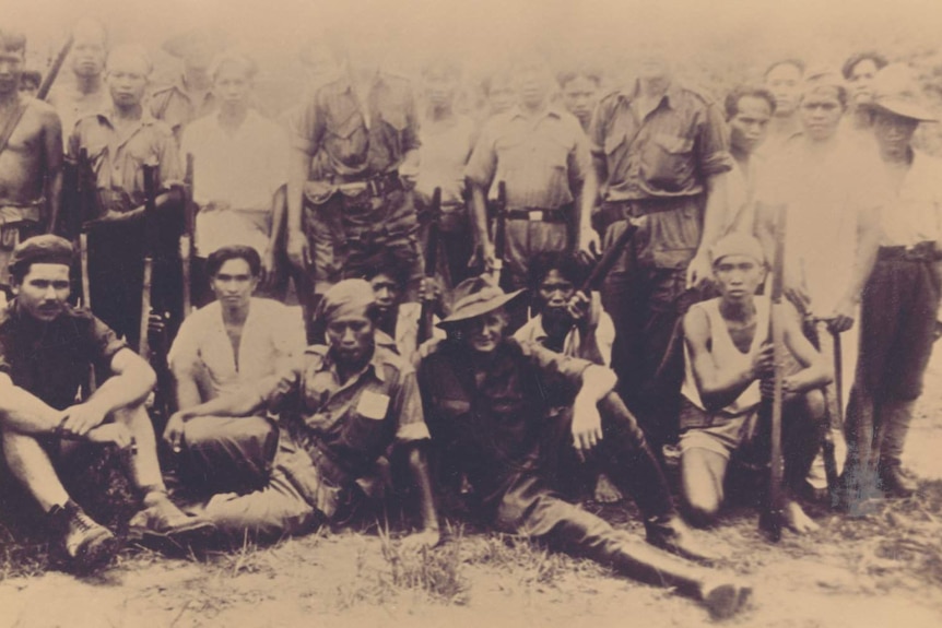 Jack Tredrea (front right) with other members of Z Special Unit and local tribesmen at Belowit, Borneo, May 1945.