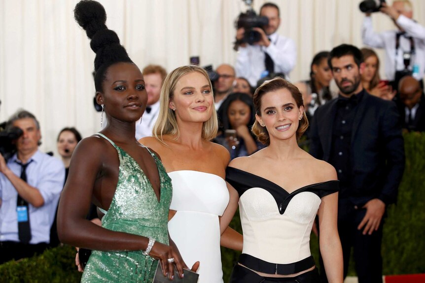 Lupita Nyong'o, Margot Robbie and Emma Watson pose on the red carpet