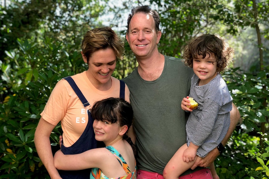 Madeleine with her husband, Sam, and daughters Scarlett and Nina.