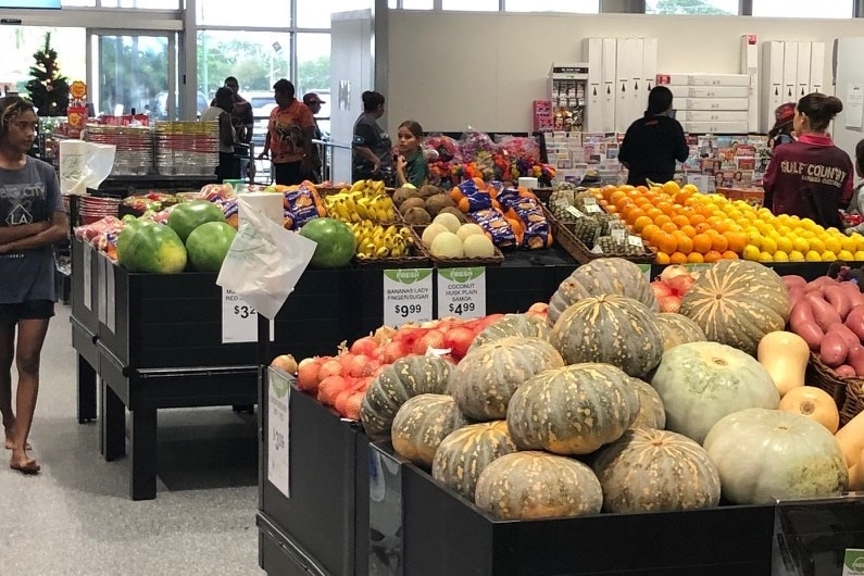 customers shopping in a grocery store