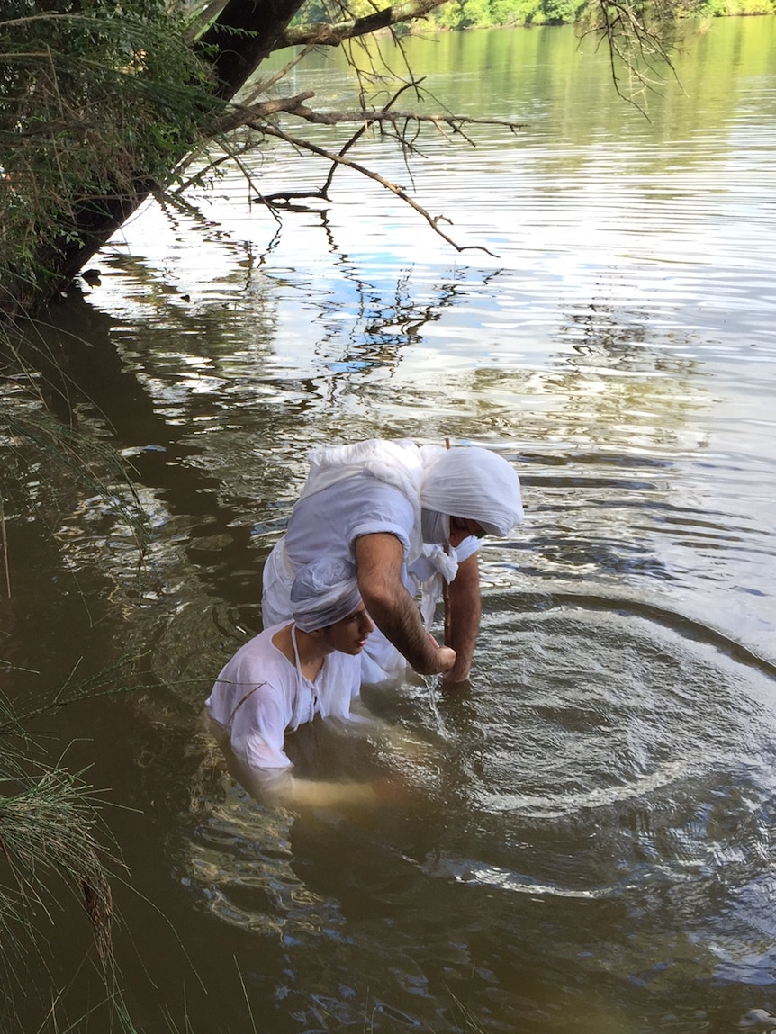 A Mandaean baptism ceremony on the Nepean River
