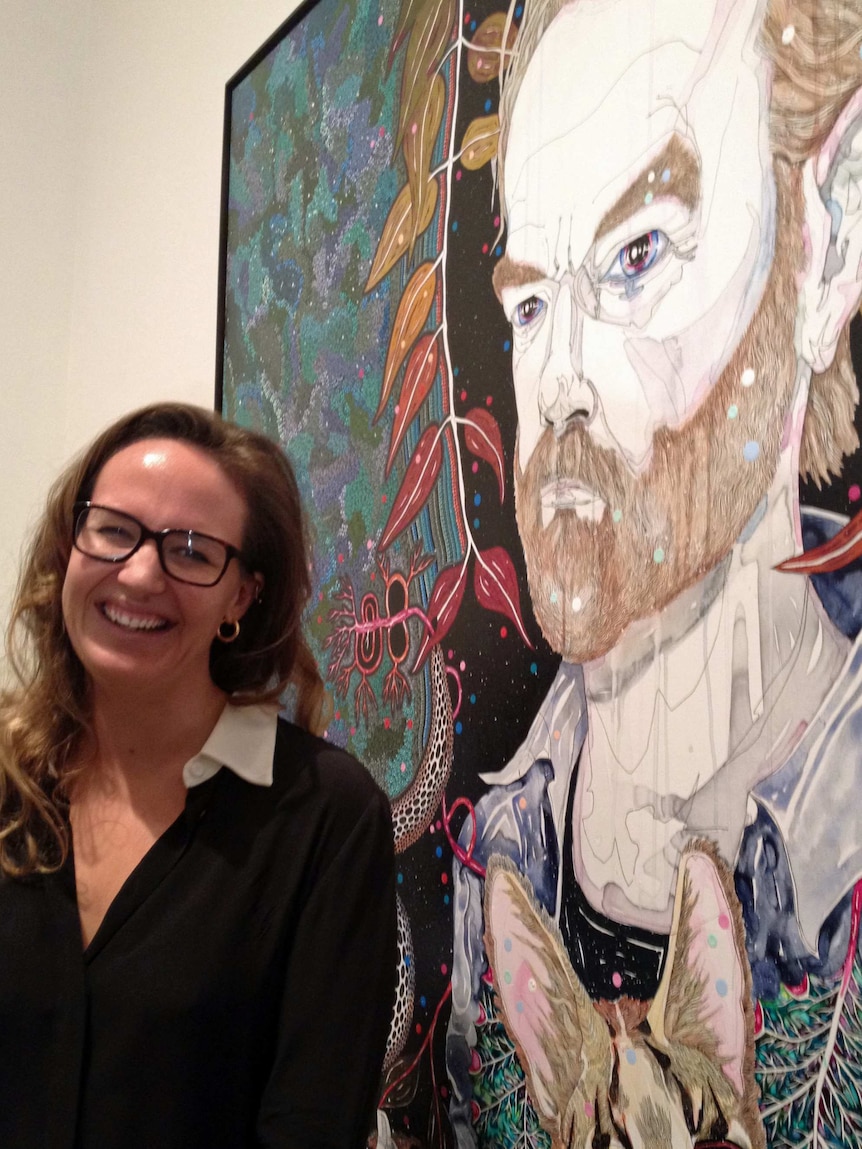 Archibald winner Del Kathryn Barton with her portrait of Hugo Weaving