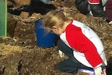 girl planting seedling