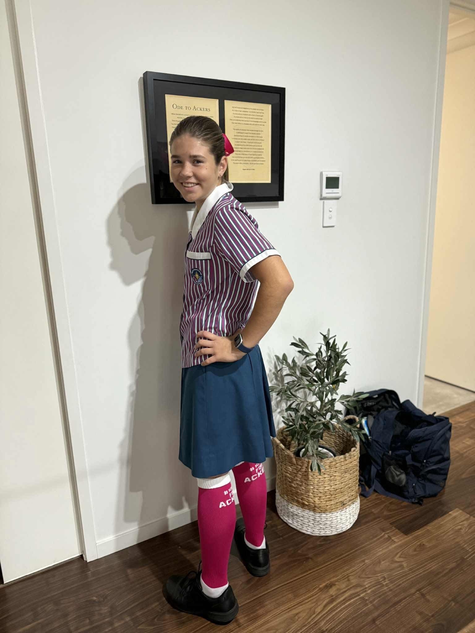 Young Girl brings pink socks in my late father's memory