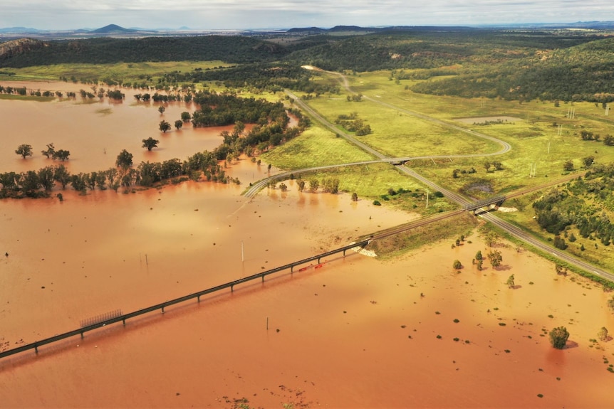 Highways are flooded by brown river water.