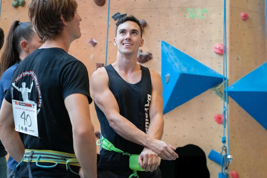 Campbell Harrison waits to compete in a speed climbing competition at a climbing gym in Western Sydney.