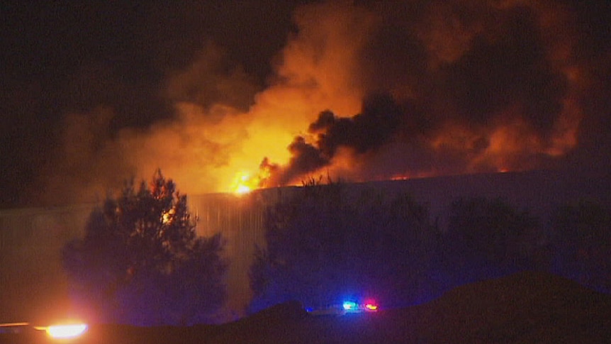 Flames engulf the recycling plant at Wingfield in Adelaide