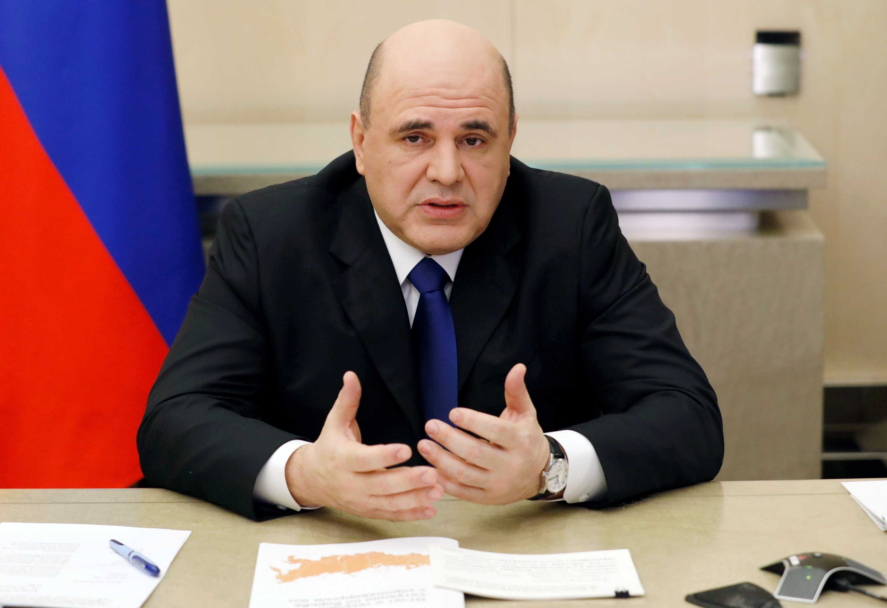 Russian Prime Minister Mikhail Mishustin tells President Vladimir Putin