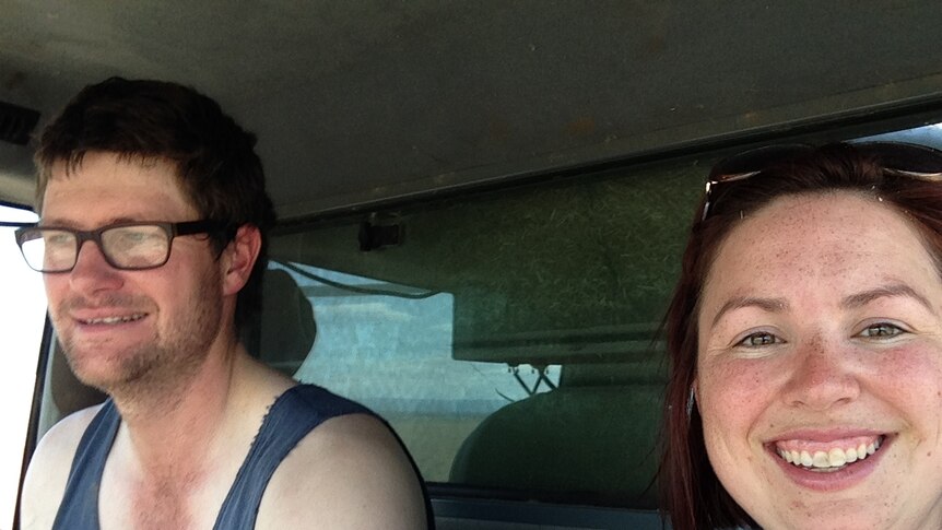 Grain grower Allister Morris and rural reporter Laura Poole take a header selfie.