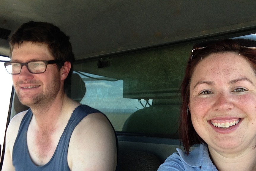 Grain grower Allister Morris and rural reporter Laura Poole take a header selfie.