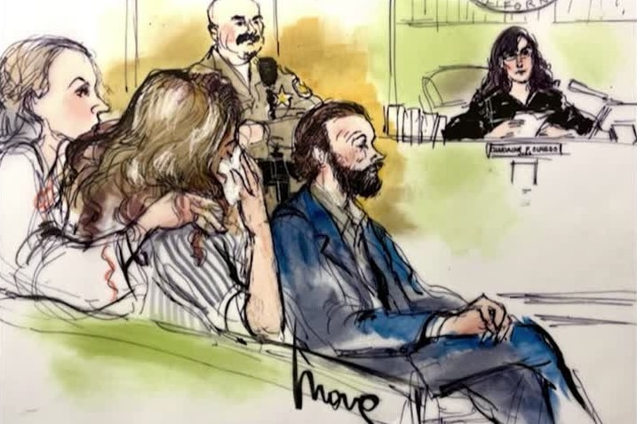 A sketch of a courtroom in which a woman is crying and being comforted by another, as a man, security guard and judge listen on