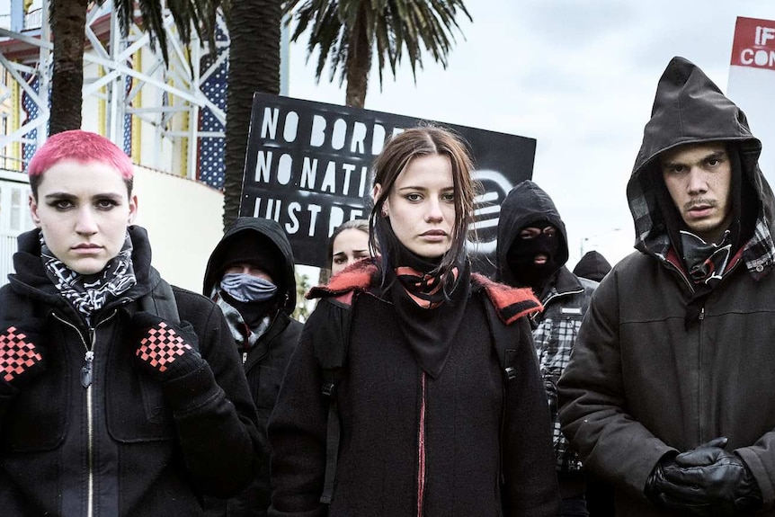 Syd Zygier as Maeve, Lily Sullivan as Petra and Tsyan Towney as Danny dress as rebels in a promo image