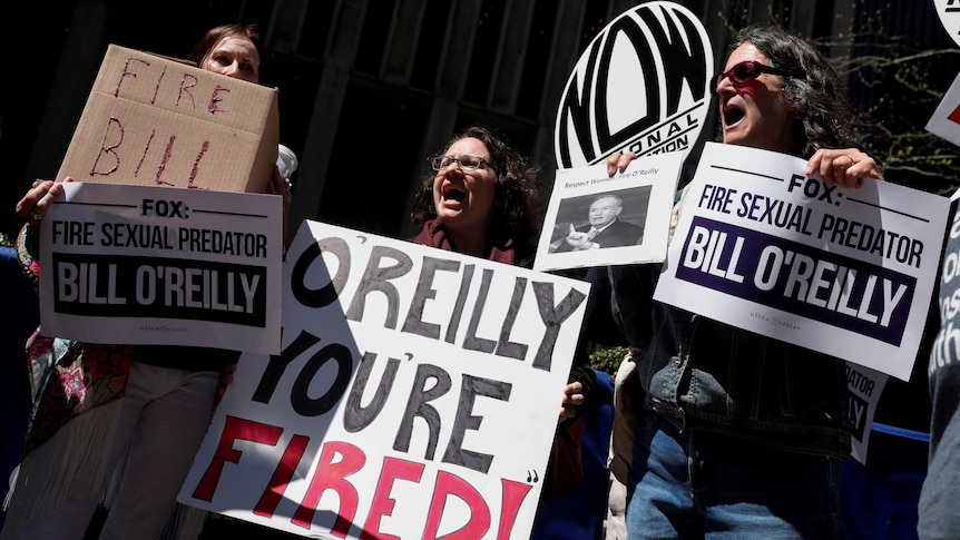 Demonstrators protest calling for the firing of Fox News Channel TV anchor Bill O'Reilly.
