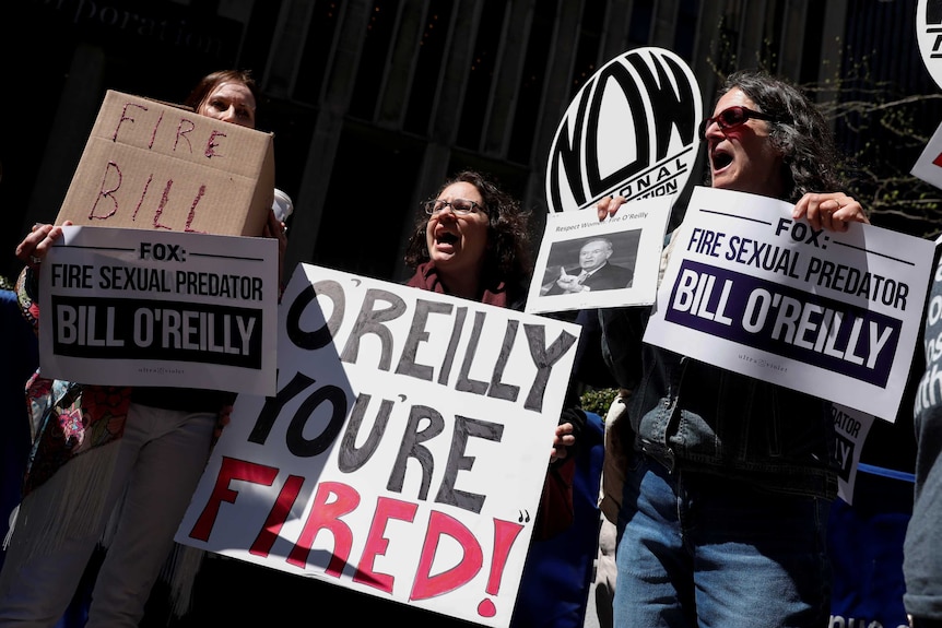 Demonstrators protest calling for the firing of Fox News Channel TV anchor Bill O'Reilly.