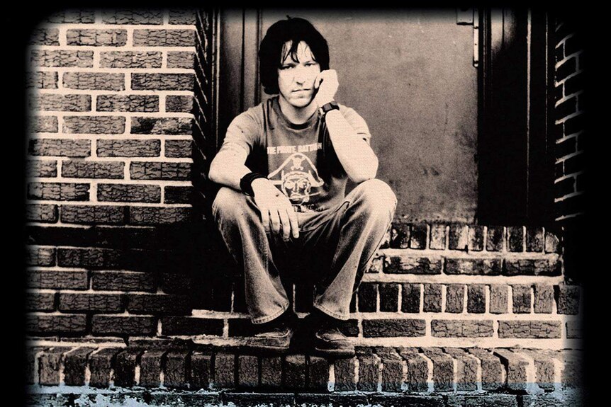 Elliott Smith. From the cover of From A Basement on the Hill