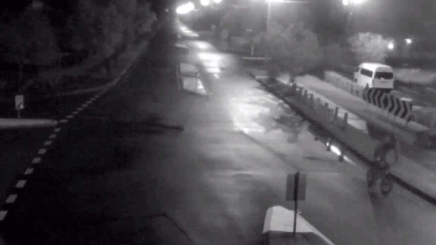 CCTV footage of a man on a bike leaving the scene of an attempted abduction of a 6yo girl at Loganlea.