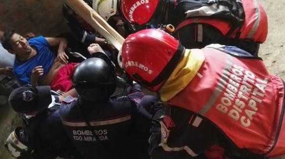 Manuel Vasquez being rescued from a partially collapsed structure in Jaramijo, Ecuador.