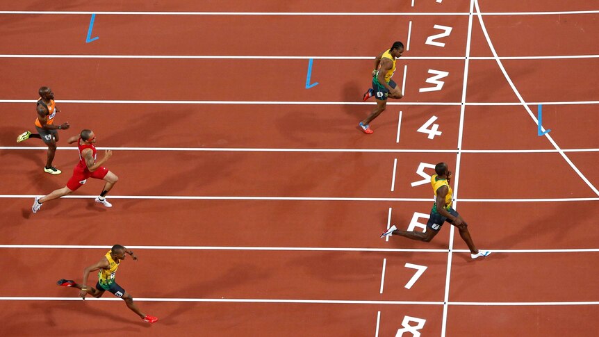 Usain Bolt crosses the finish line to win the men's 200m final at the London 2012 Olympic Games.